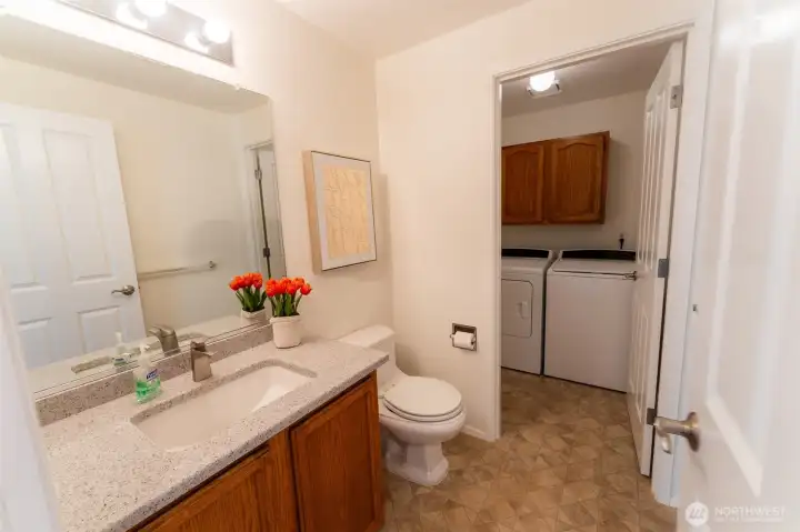 Downstairs half bath and laundry room