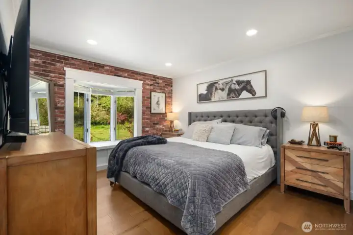 Primary bedroom with bay window