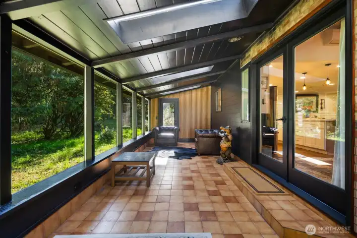 Beautifully updated sunroom where you can enjoy the wildlife and your peaceful back yard