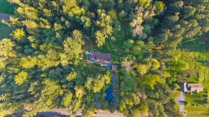 Notice your very own pond in between the horseshoe driveway!
