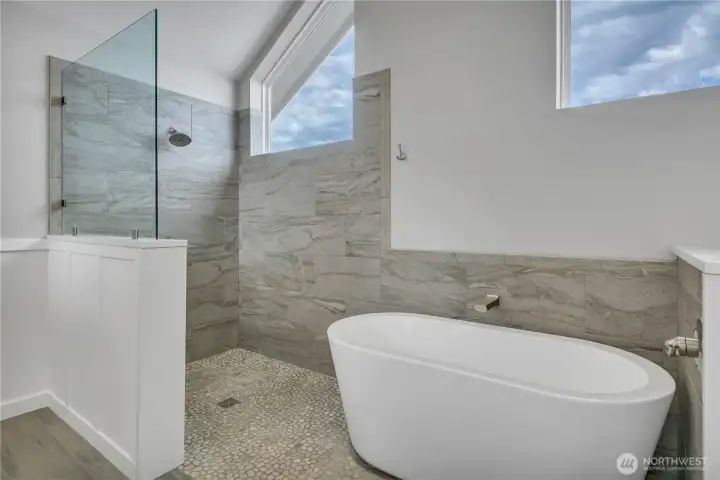 Primary Bathroom with soaking tub and waterfall shower