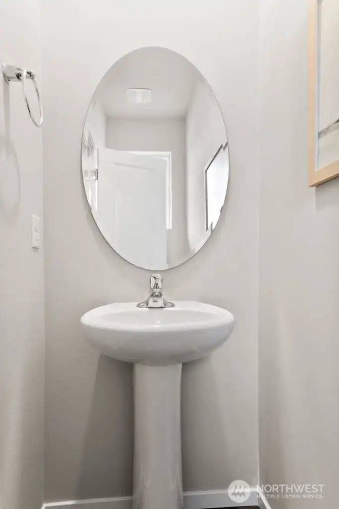 Downstairs powder room-Photos are for representational purposes only, colors and features may vary. Downstairs powder room-Photos are for representational purposes only, colors and features may vary.