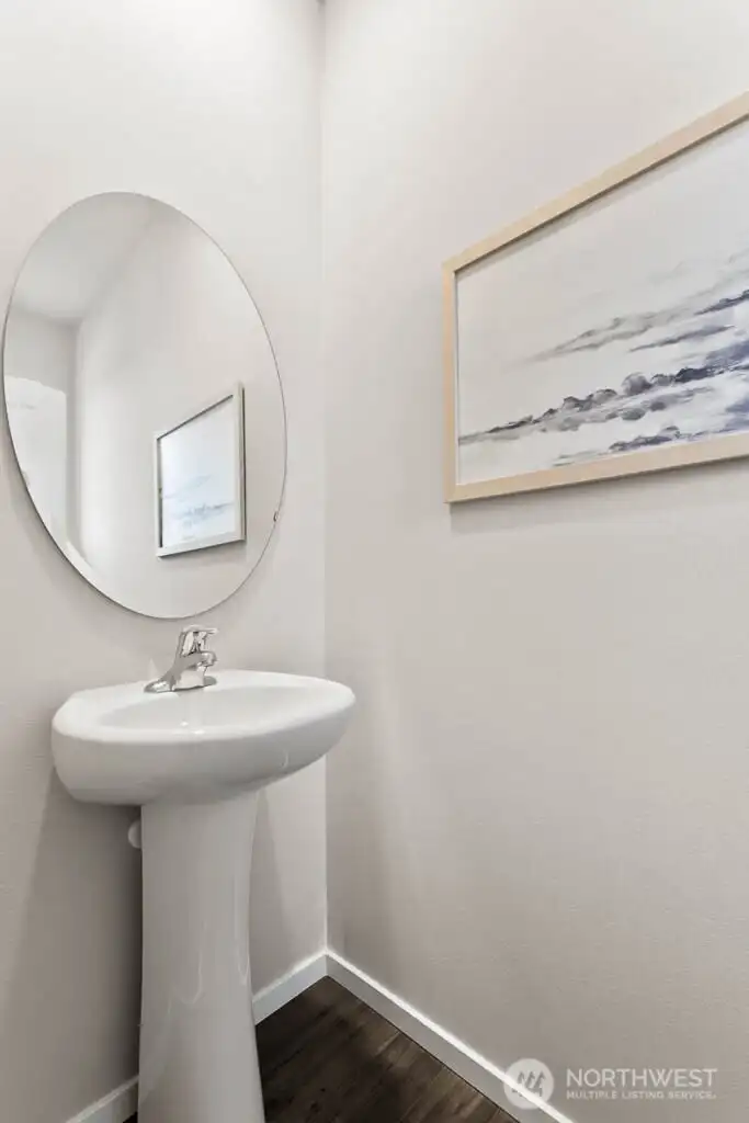 Downstairs powder room-Photos are for representational purposes only, colors and features may vary. Downstairs powder room-Photos are for representational purposes only, colors and features may vary.