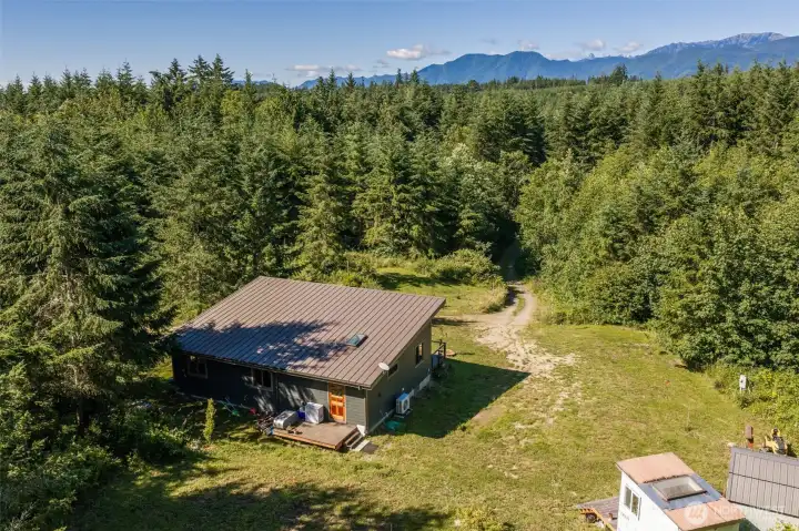 This property includes a natural pond, Chimacum Creek, fruit trees, Japanese maples, and a 120 SF unfinished bathhouse + a storage shed. This property includes a natural pond, Chimacum Creek, fruit trees, Japanese maples, and a 120 SF unfinished bathhouse + a storage shed.