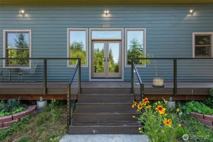 Wraparound deck (420 SF) spans the full length of the home. Wraparound deck (420 SF) spans the full length of the home.
