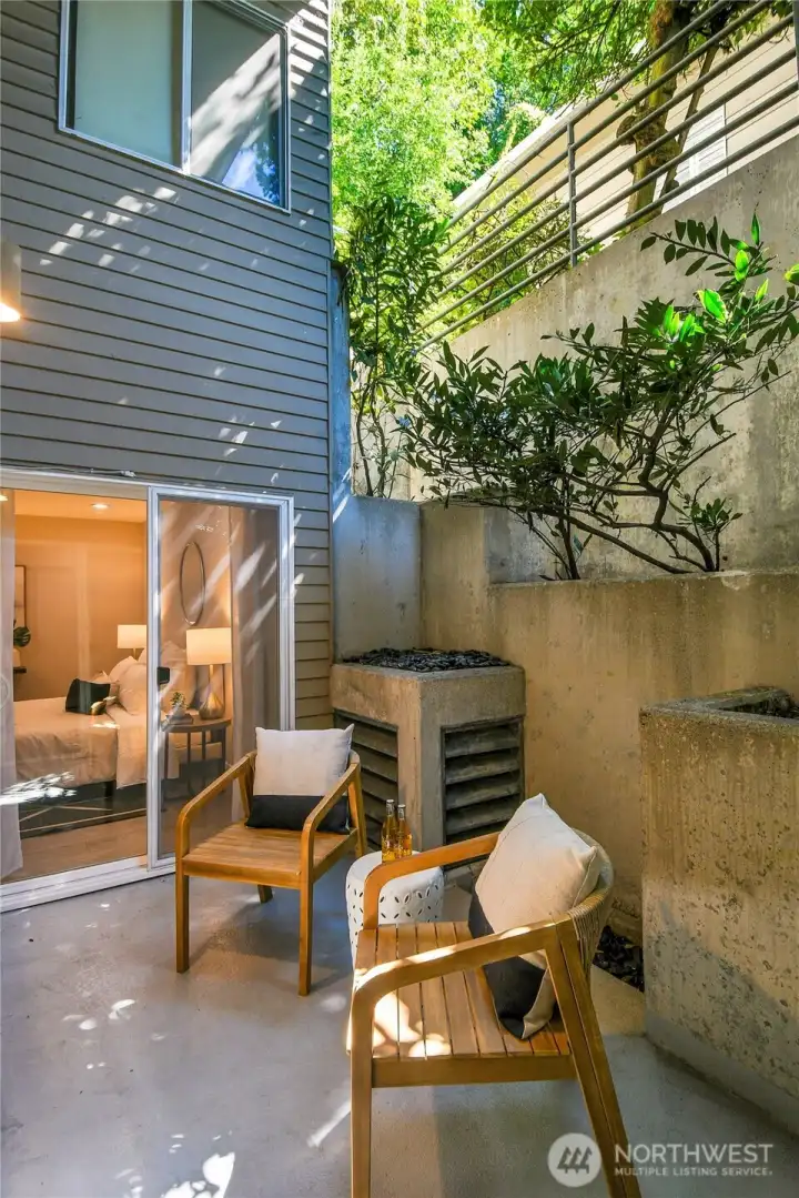Another private, quite outdoor space. Perfect for yoga, journaling, or a quiet shaded reading space. Another private, quite outdoor space. Perfect for yoga, journaling, or a quiet shaded reading space.