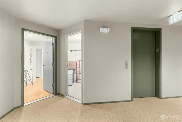 The front door to the home is on the left, the storage unit door is in the middle, and the elevator is on the right. The storage unit is so convenient! Just outside the door!