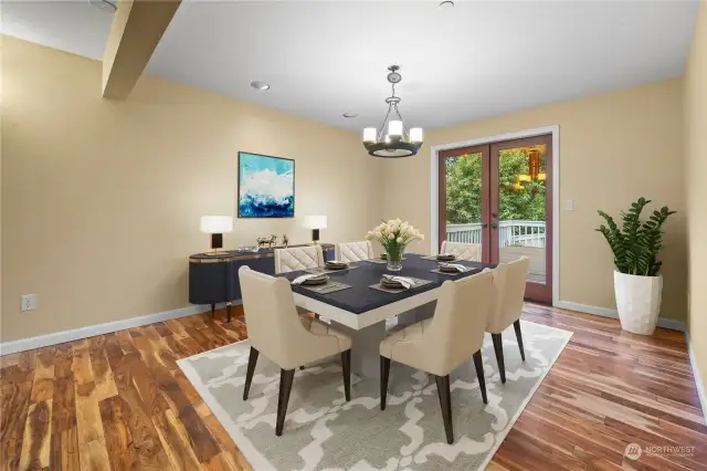 Formal dining with French doors to the backyard via large tiered deck.