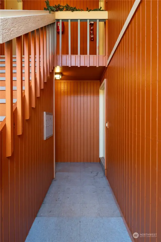 Walkway to bottom unit front door.