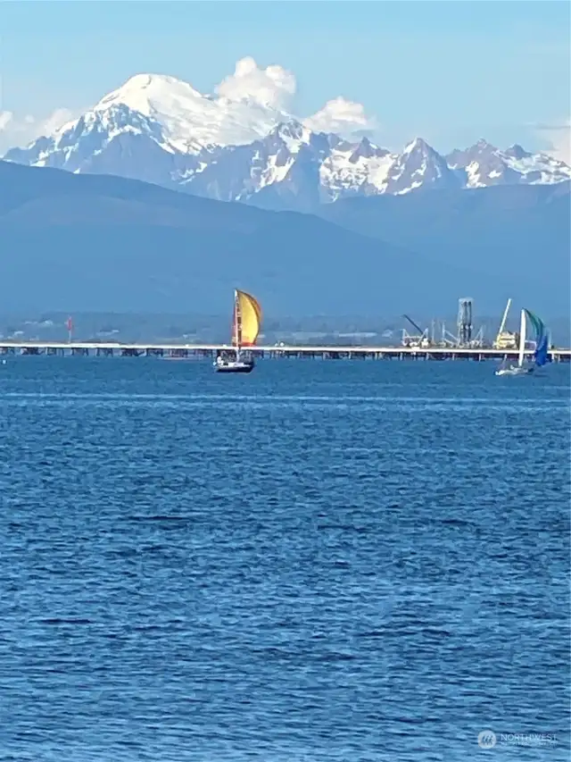 I took this last summer from a live music performance that was part of the annual summer music concert series. (Yes FREE):: That’s Mount Baker.