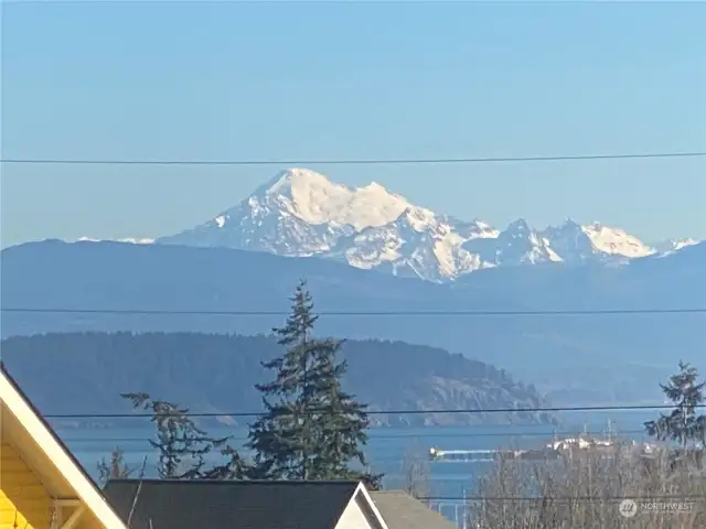 Yes…. So, this was taken from YOUR FRONT YARD. I stood on the roof of my truck about thirty feet into the driveway to simulate a possible second floor view from a front yard structure that you could possibly build. Perhaps, a garage with a flat style apartment with balcony on this Baker view side?  Do your research.