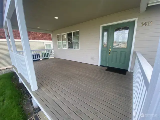 A simply grand porch.  It’s 22 feet wide and 9 feet deep to the front door. This relaxation space stays cool in the summer given this ‘front north facing’ orientation.  A hammock or patio set would a great house warming gift right?