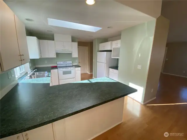 There’s storage under the bottom left of this counter accessible from this dining room area.