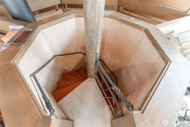 Circular staircase to the upstairs loft