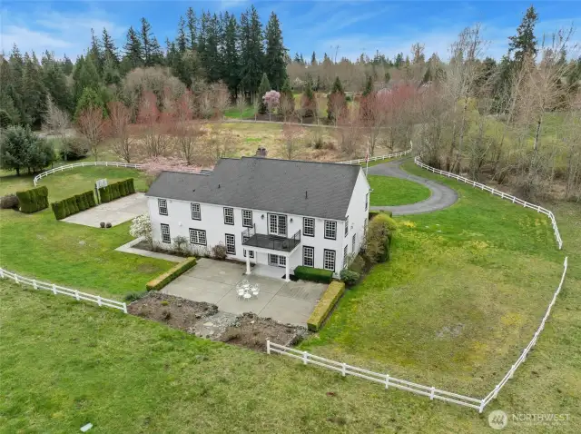 Backside of the house with large patio.