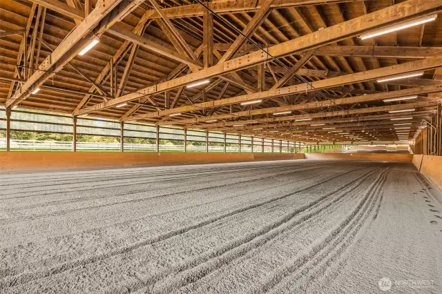 70 X 200 indoor arena with quality Sand and Rubber mix footing, mirrors and slanted kick walls