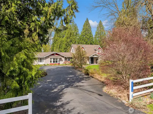 Storybook setting.  The home is set ideally with its own private entrance from the horse components for owner privacy.