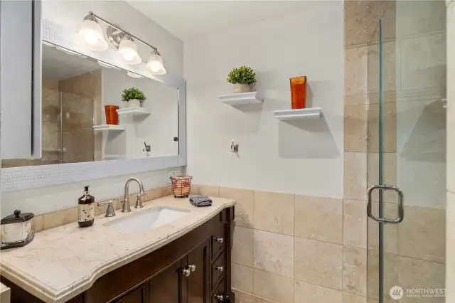 Bath adjacent to junior primary suite