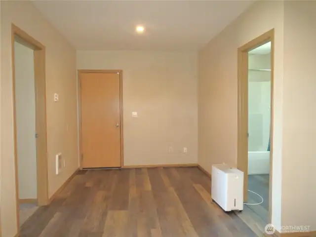 DOWN STAIRS IS AN ENTERTAINMENT AREA WITH PLANK VINYL FLOORING!