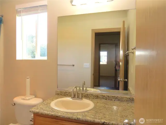 SECOND BATH IS ACROSS THE WAY WITH NEW GRANITE TOPPED VANITY!