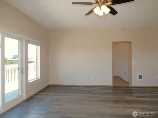 VIEW OF THE LIVING AREA TOWARD PRIMARY BEDROOM!