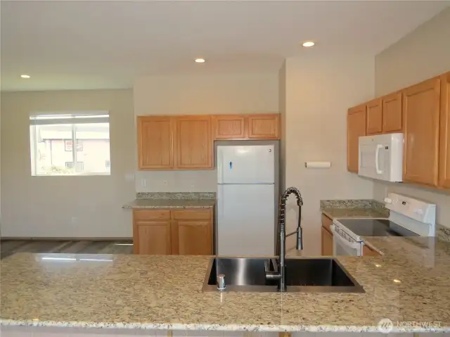 KITCHEN HAS NEW GRANITE COUNTER TOPS AND PENINSULA EATING AREA!