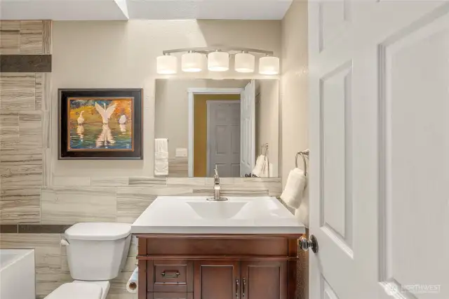 beautiful tile completes this amazing bathroom