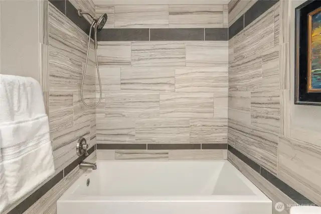 beautiful tile completes this amazing bathroom