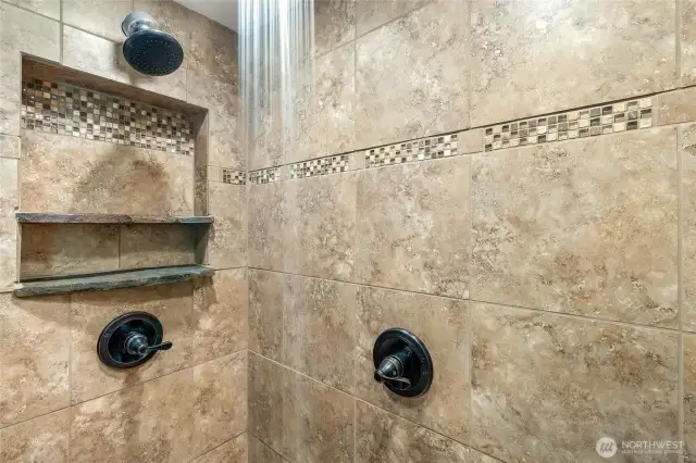 Primary 3/4 bathroom with skylight and heated floor