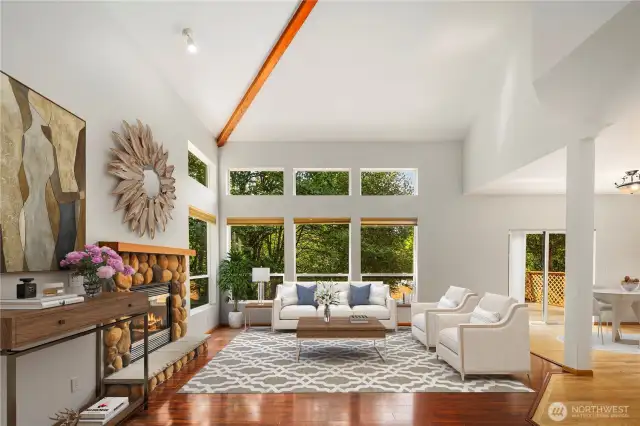 Living Room w/ Fireplace & High-Vaulted Ceilings