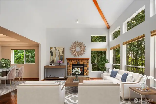 Living Room w/ Fireplace & High-Vaulted Ceilings