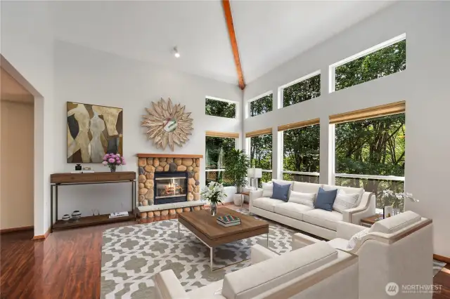 Living Room w/ Fireplace & High-Vaulted Ceilings