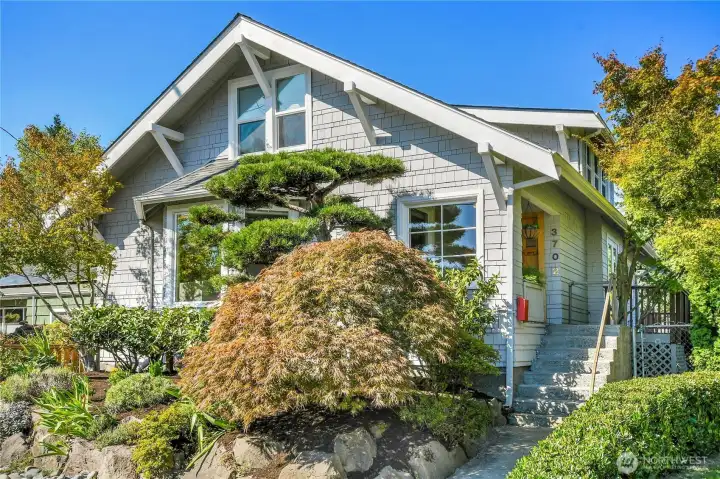 Welcome home to 3702 SW Cloverdale St - A lovely 1916 Craftsman home sited on a generous corner lot in the Gatewood neighborhood of West Seattle.