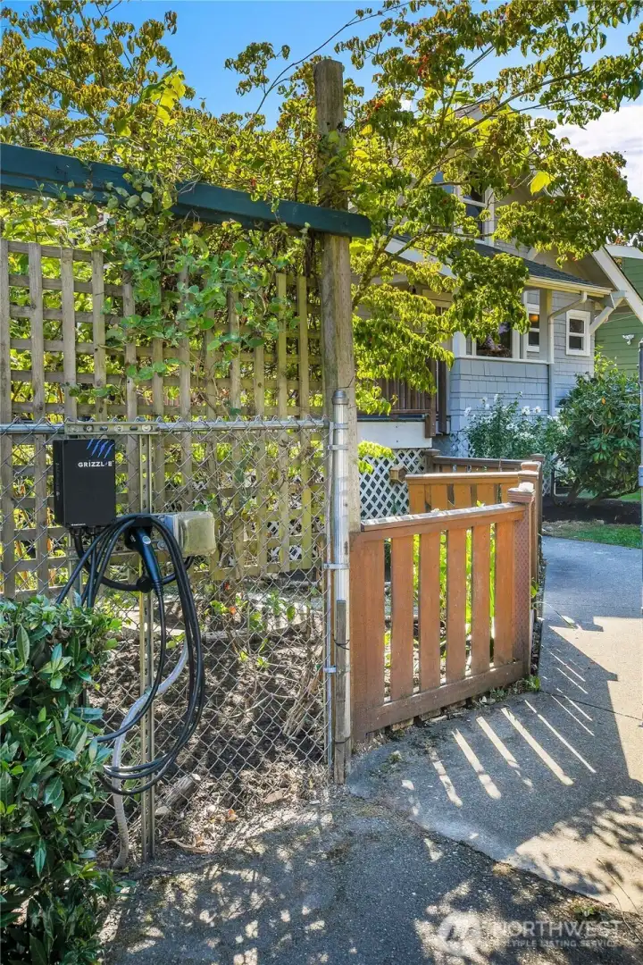 new EV charging spot at the parking pad.
