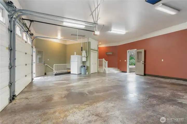 Large 2+ car garage with access to 1061 partially finished basement space