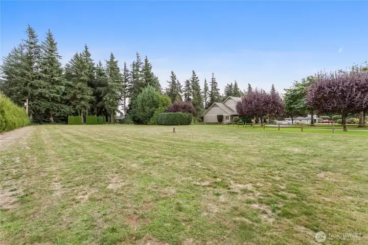 A total of 2.28 acres, this extra field could be used for a horse pasture or smaller farm animals. Fantastic sandy loam soil supports animals all year round.