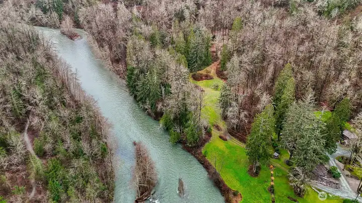 In the lower right corner you can see the pump house of the neighbors just left of the Y in the road. this property line starts to the left of the pump house.