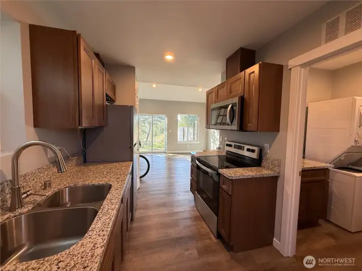 GRANITE COUNTERS, LIKE NEW CABINETRY AND APPLIANCES