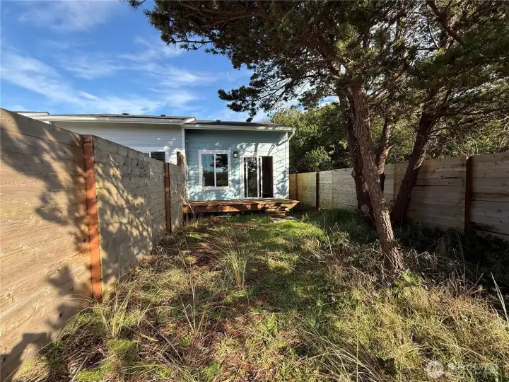 PARTIALLY FENCED BACKYARD