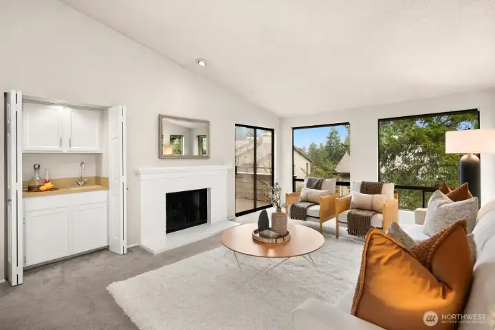 Vaulted ceilings and built-in bar space.