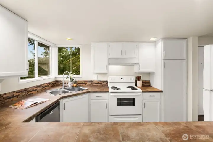 Ample counter space + more natural light.