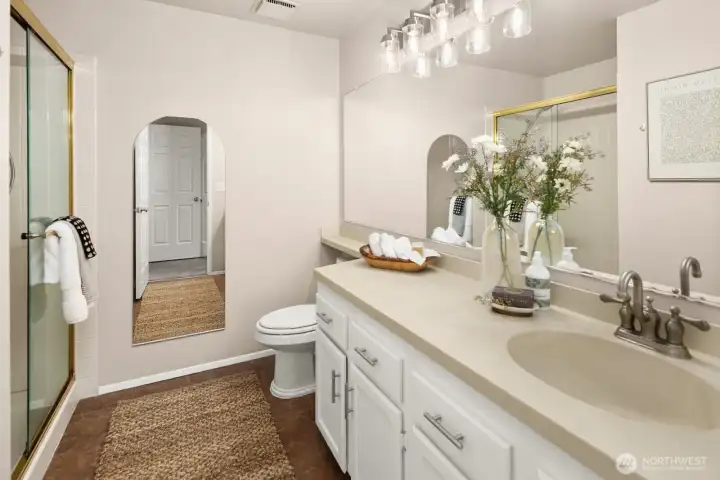 Primary en suite with great storage and counter space.