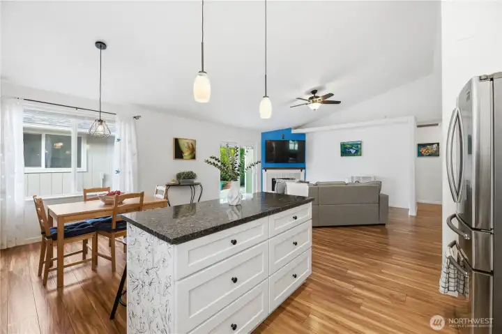 Kitchen with granite counters, custom cabinetry and lots of storage