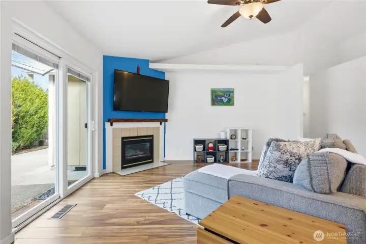 Cozy up by the fireplace or step outside to your bright and sunny patio