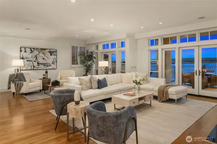 The main living area is filled with natural light and designed for comfortable everyday living.  Expansive windows bring in beautiful views and create an open, airy feel.