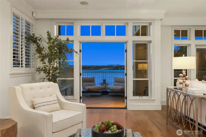 The open-concept living space offers seamless flow between the kitchen, dining, and sitting areas.  Ideal for both entertaining and relaxed nights at home.