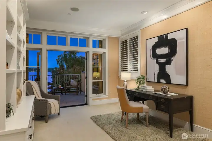This light-filled office offers a quiet and comfortable worksapce with direct access to a private deck, creating and inspiring work-from-home setting.