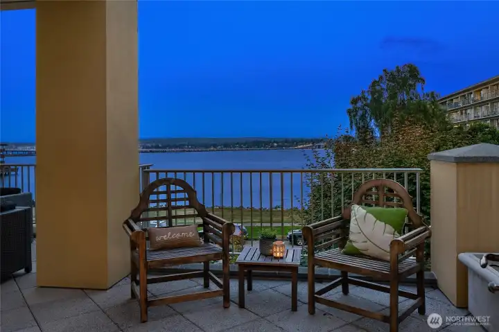 The adjoining deck extends the office outdoors, providing a peaceful place to take in fresh air and water views throughout the day.
