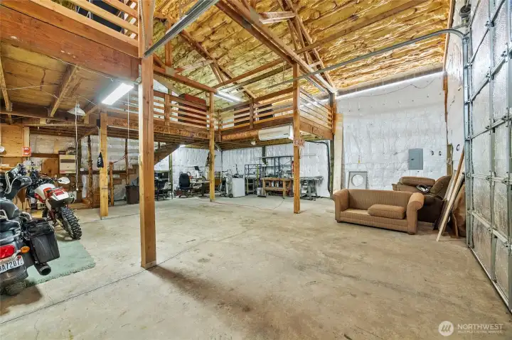2 bays with work area, bathroom, loft, and 2 lean to's