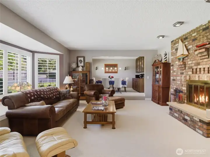 An oversized living room adjoining to formal dining